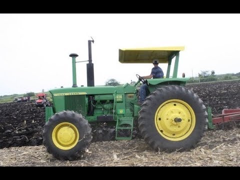 Image result for tractors and plowing
