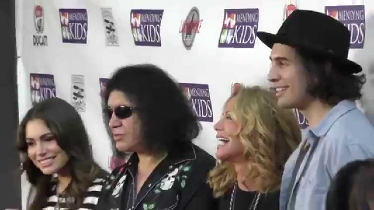 Gene, Nick and Sophie Simmons and Shannon Tweed on red carpet at Mending Kids Music On A Mission at