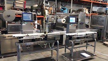 Ishida checkweigher with automatic reject.