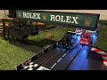 Racing on our slot car track with trucks.