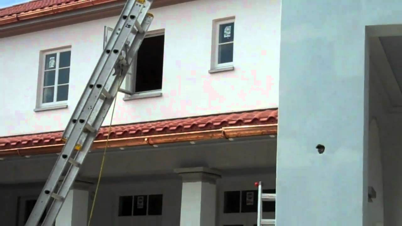 Eurocraft HalfRound Gutters MidInstallation Miami, FL Istueta