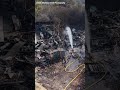 Drone footage shows damage caused by major riverside building blaze