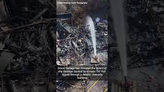 Drone footage shows damage caused by major riverside building blaze