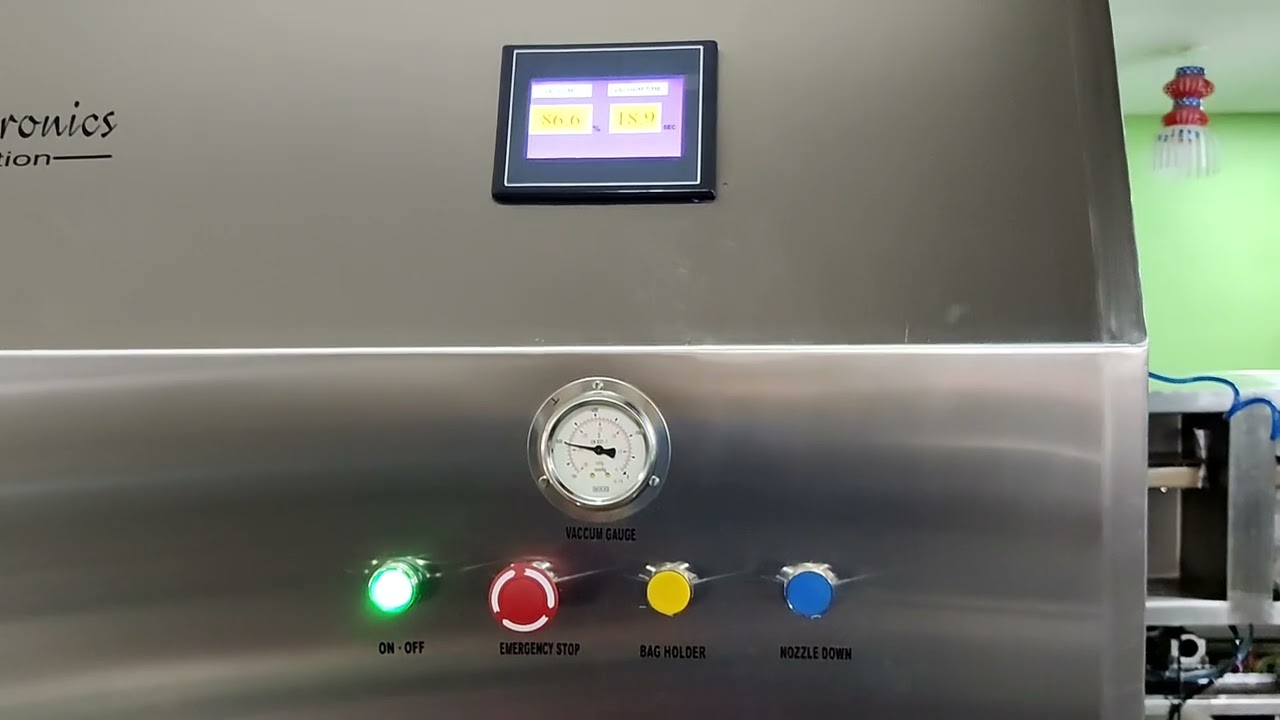 Vertical Nozzle Type Vacuum Packing Machine