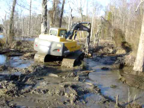 Excavator Busting a Huge Beaver Dam