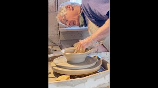 Mark Hewitt throwing a pottery bowl, one of 150 he made that day