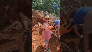 Why are people going to Arkansas from all over the world to dig in the dirt?