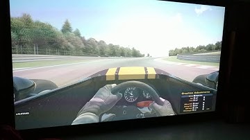 A friend testing Iracing with Gecko dynamic seat on optoma projector 3.6m base screen