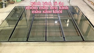 Cánh kính tủ áo khung nhôm màu đen tay nắm cnc ,kính màu xám khói sang trọng, hiện đại