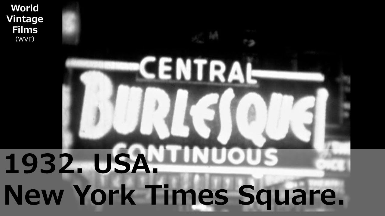 1932. Неоновая вывеска на Таймс-сквер, Нью-Йорк, США. Ценный образ. Сцена 1930-х годов.