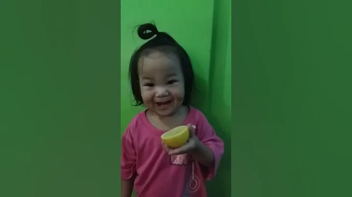 Aira chang eating lemon