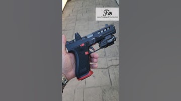 ported Gen 5 Glock 17 built by Firing Squad Firearms tlr-8ag trijicon rmr stippling timney trigger