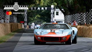 Legendary double Le Mans winning Gulf Ford GT40's victory parade at Goodwood