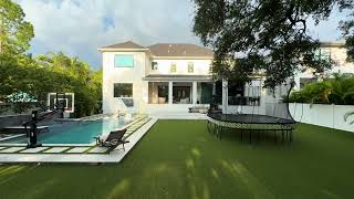 3007 S West Shore Blvd | Sunset Park Home with Dual Primary Suites, Pool &amp; Wine Room