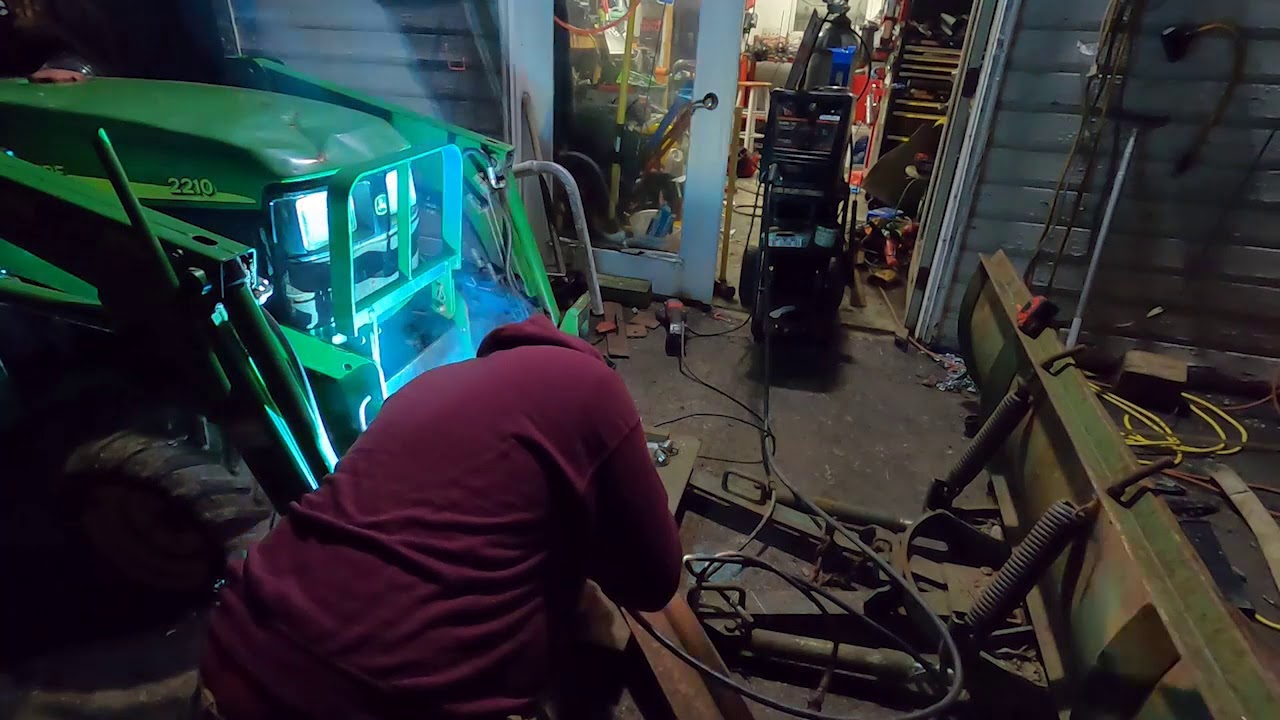 Welding John Deere tractor loader quick attach to an old 7.5 ft truck snow plow before the storm!