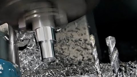 Scary Gang Tooling on cnc Lathe. Turn 2011 alloy, stub drill, drill and Sumitomo parting tool