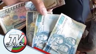 Workers dug up old Philippine Peso bills in Tandag City | TV Patrol North Mindanao
