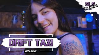 Annie chirps while riding in drift taxi.