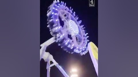 Fairground ride snaps mid-air