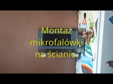 Montaż mikrofalówki na ścianie.