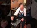 Howard demonstrates how to clean the ink stone