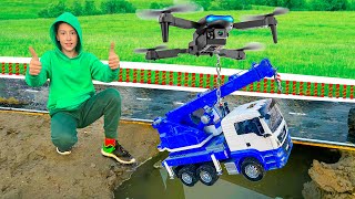 Damian rescues the cars from the mud with the drone