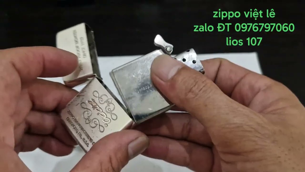 Zippo 65th Anniversary, convex bottom, slanted text. (Sold out