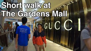 gucci store gardens mall