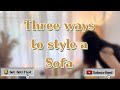 Three ways to style your old boring three seater sofa.