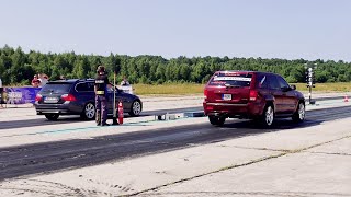 BMW 330d E91 vs Jeep Grand Cherokee 6.1 Kompressor 1/4 mile drag race