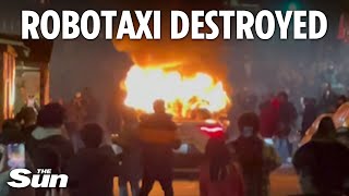 San Francisco mob vandalizes Waymo self-driving robotaxi before setting ablaze