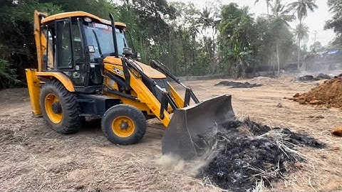 Jcb 3dx dozing and moving ash powder to a corner of plot #jcbdozer #jcb #jcb3dx #jcbtractor #jcb3cx