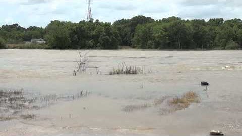 Thumbnail of Water levels rising on  Morgan City sea wall after opening the Morganza spillway.