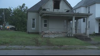 Police say man lost control of car, damaged two homes