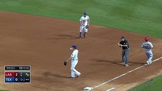 LAA@TEX: Rosales makes a diving stop, tosses for out