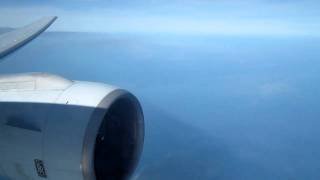 Cathay Pacific Boeing 777-300 Passing Through Some Clouds