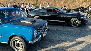 amateur driving a VAZ 2102 versus rich people driving expensive cars