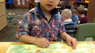 Jacob reading story and retelling it as he remember