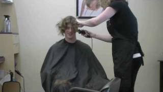 Sam Meyer Buzz's his hair for the Marines