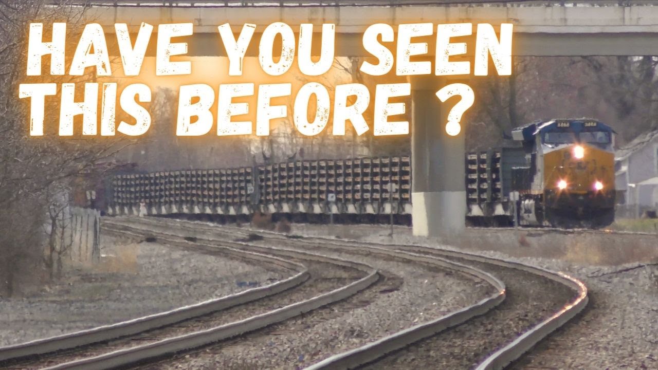 Have you seen this before? Ribbon-rail train with mix manifest on the rear...Fast train & diamonds