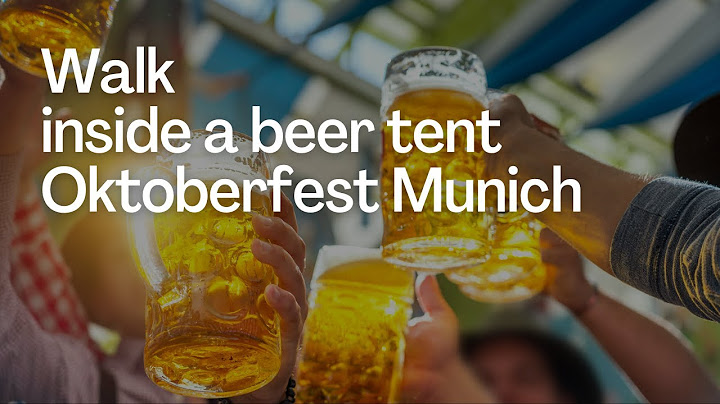 Oktoberfest 2022 inside a beer tent - Oktoberfest walk -traditional fest Munich - Fischer Vroni live