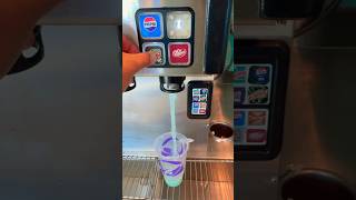 Mountain Dew Baja blast zero sugar soda drink refill at Taco Bell soda fountain machine ￼