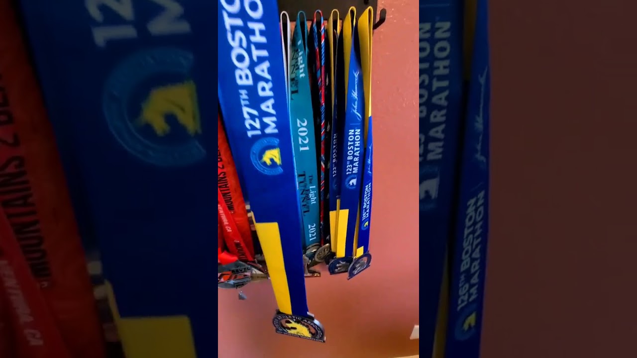 Hanging my 2023 127th Boston Marathon medal!
