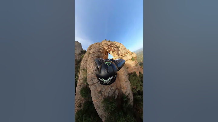 GoPro | Death-Defying Wingsuit Flight through Hole 🎬 Javi Centeno Gomez #Shorts #Wingsuit