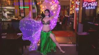 Bellydancer in green costume at Shiraz Singapore!