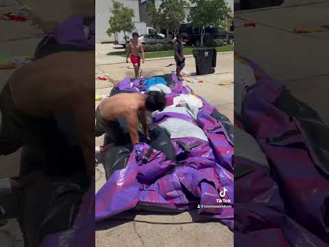 Thumbnail of Watch us drop and roll up a 19’  waterslide. Best rolling crew in Louisiana! #waterslides