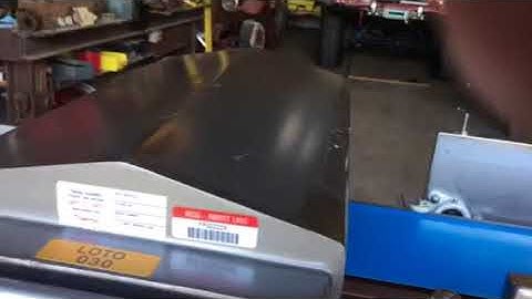 Operational video of Goring Kerr DSP3 metal detector conveyor with belt shuttle reject