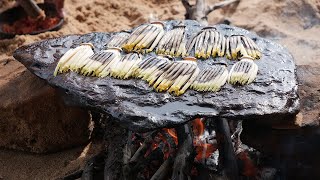 Primitive Technology - Cooking Banana flower On A Rock And Eating Delicious
