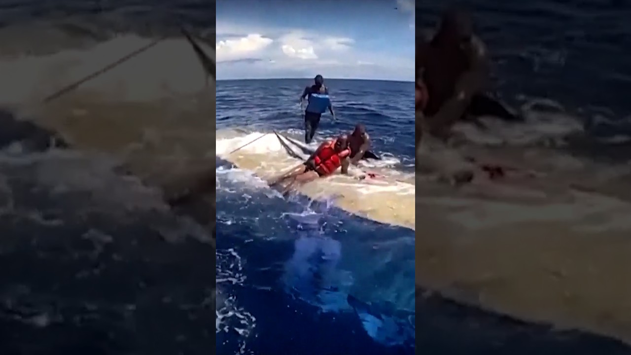 U.S. Coast Guard rescues 49 from makeshift capsized boat U.S. Coast Guard rescues 49 from makeshift capsized boat