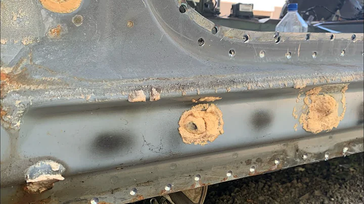 Removing rocker panels on the 06 Charger. Tons of tack welds.